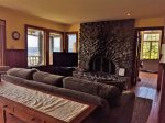 Main living area with gas fireplace ocean views